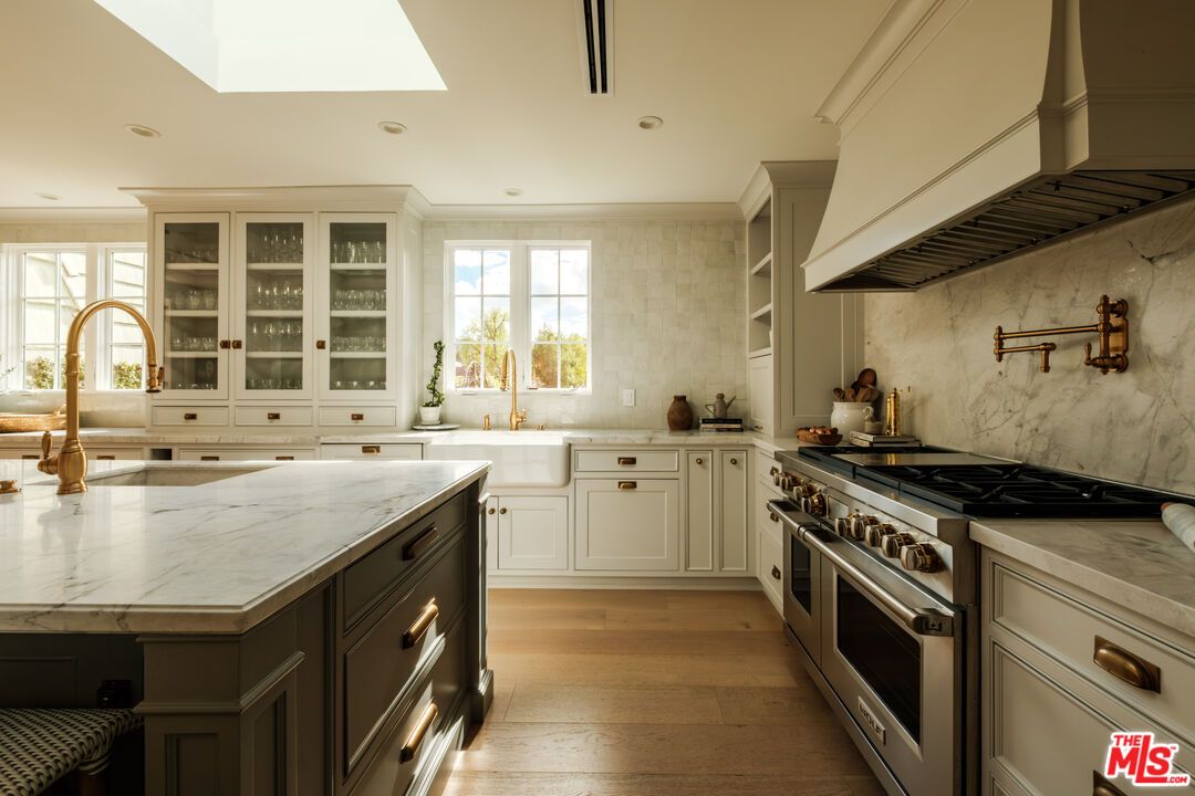 Interior, Kitchen, Marble Walls, Recessed Lighting, Stainless Steel Appliances, Wood Texture Flooring