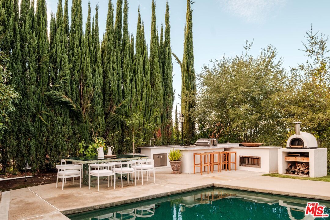 Exterior, Fireplace, Outdoor Kitchen, Pool
