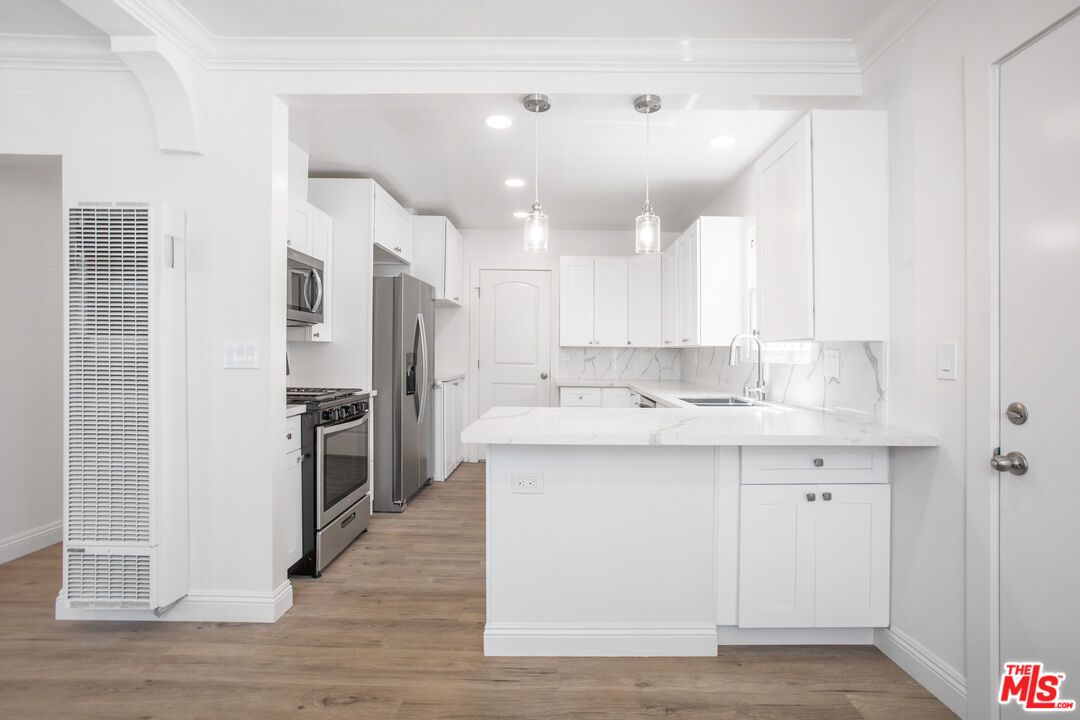 Interior, Kitchen, Pendant Lights, Recessed Lighting, Stainless Steel Appliances, Wood Texture Flooring