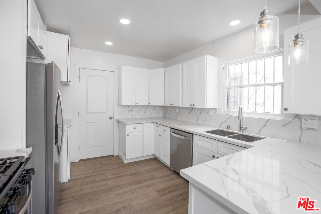 Interior, Kitchen, Pendant Lights, Recessed Lighting, Stainless Steel Appliances, Wood Texture Flooring