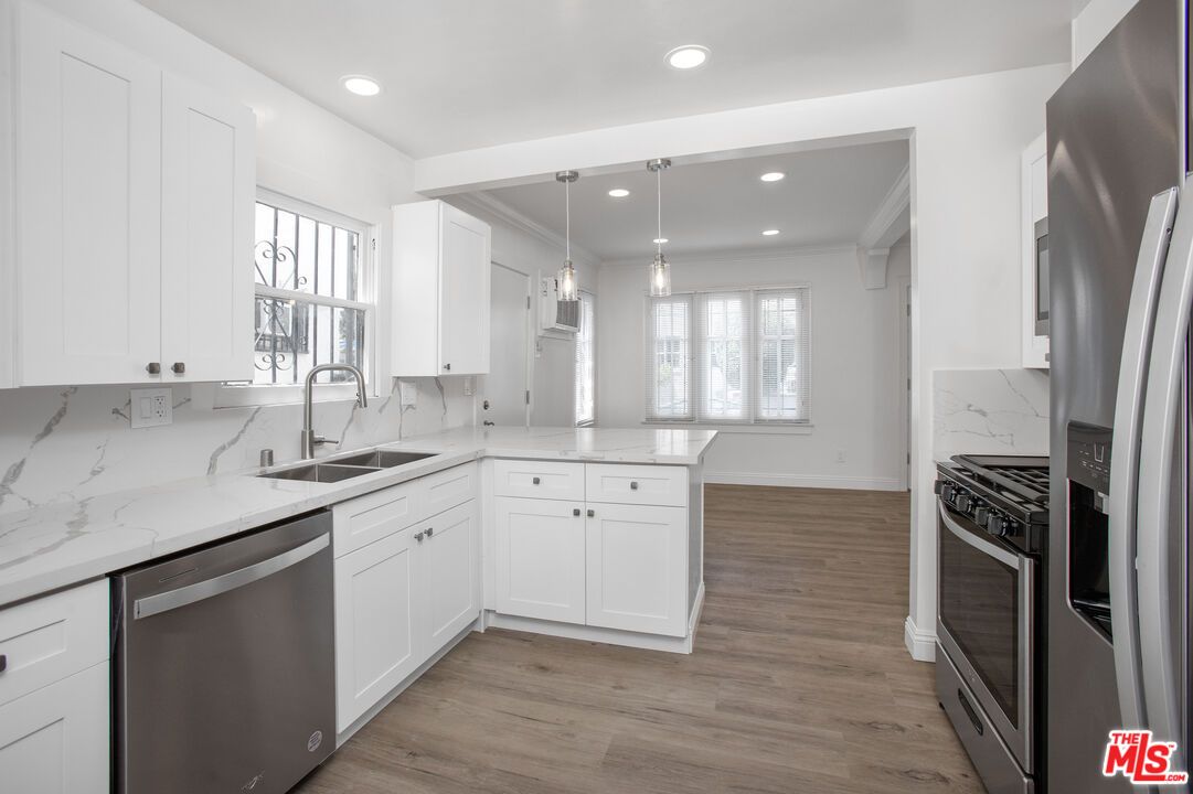 Interior, Kitchen, Pendant Lights, Recessed Lighting, Stainless Steel Appliances, Wood Texture Flooring