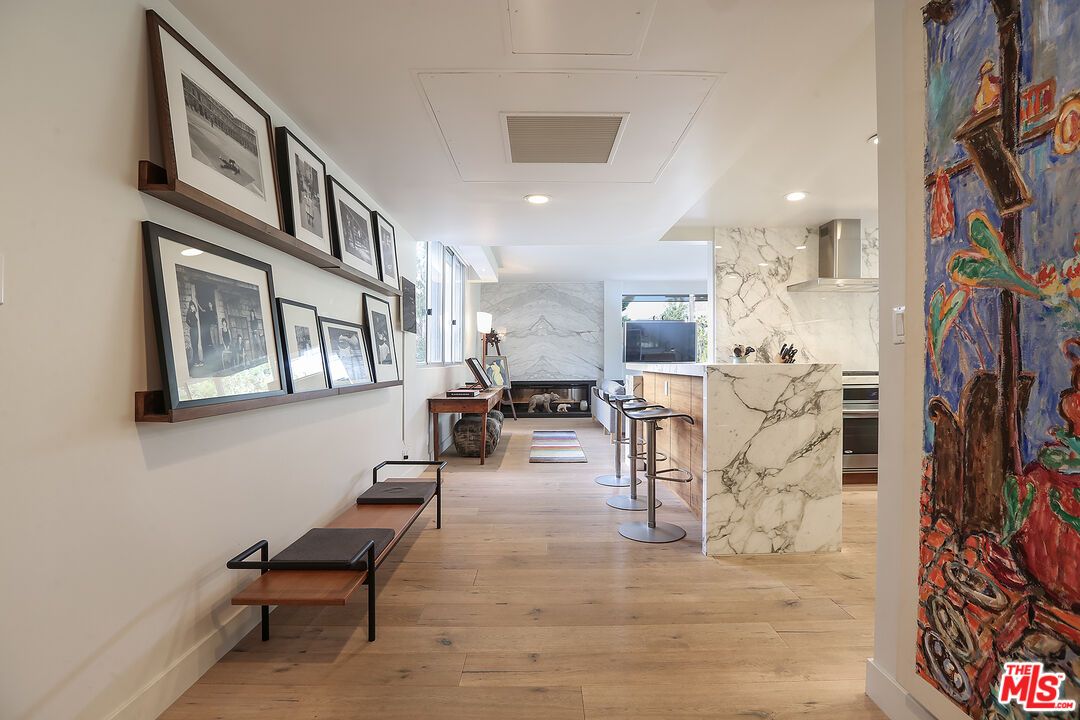 Fireplace, Interior, Kitchen, Marble Walls, Recessed Lighting, Wood Texture Flooring