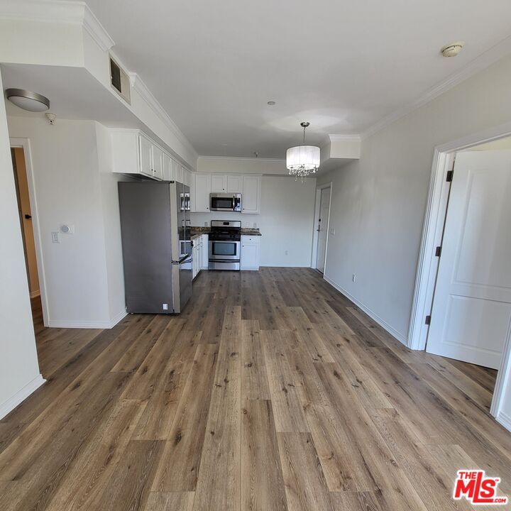 Chandelier, Interior, Kitchen, Pendant Lights, Stainless Steel Appliances, Wood Texture Flooring