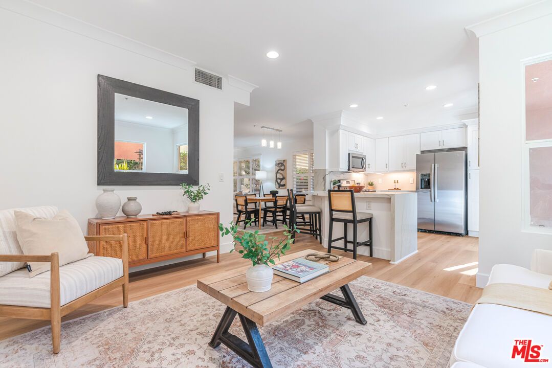 Dining room, Interior, Kitchen, Living room, Pendant Lights, Recessed Lighting, Stainless Steel Appliances, Wood Texture Flooring