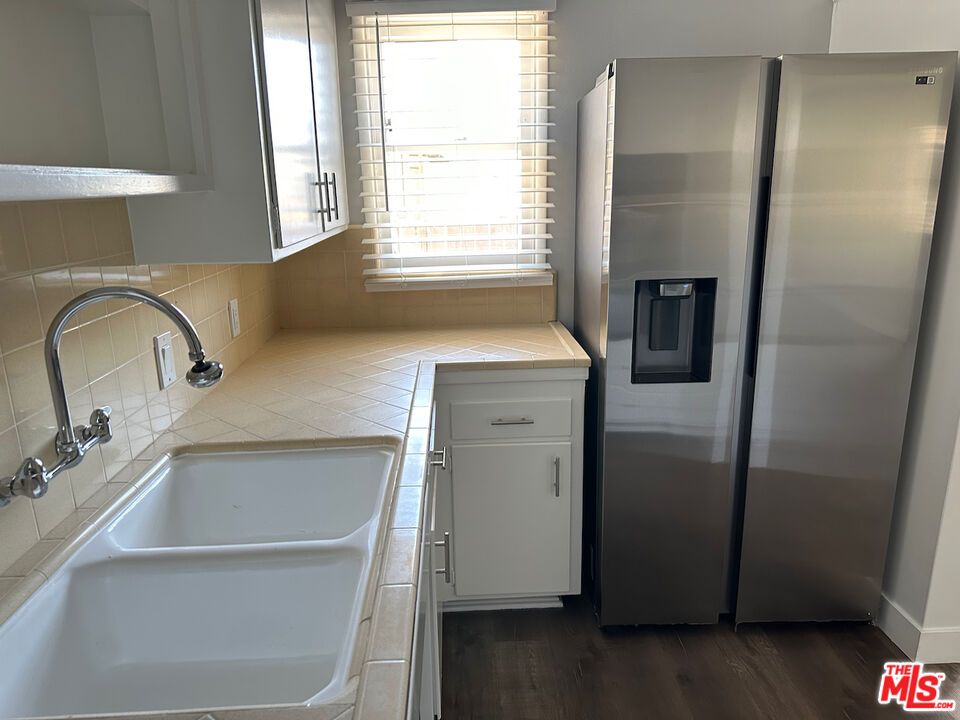 Interior, Kitchen, Tile Countertops, Wood Texture Flooring