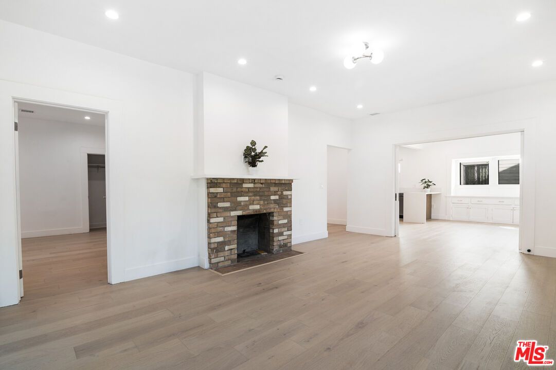 Empty room, Fireplace, Interior, Recessed Lighting, Wood Texture Flooring