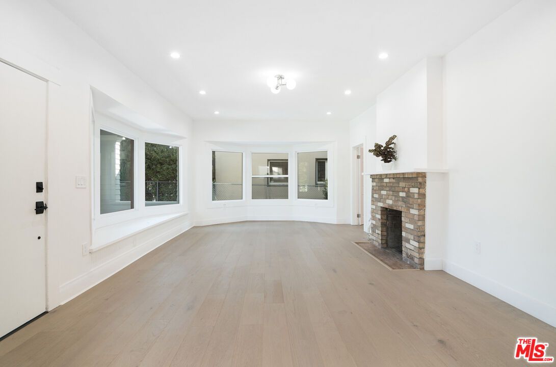 Empty room, Fireplace, Interior, Recessed Lighting, Wood Texture Flooring