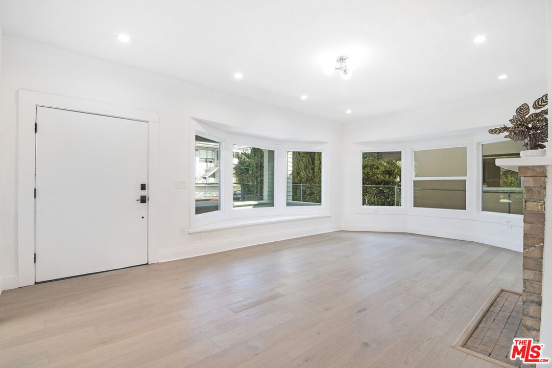 Empty room, Fireplace, Interior, Recessed Lighting, Wood Texture Flooring