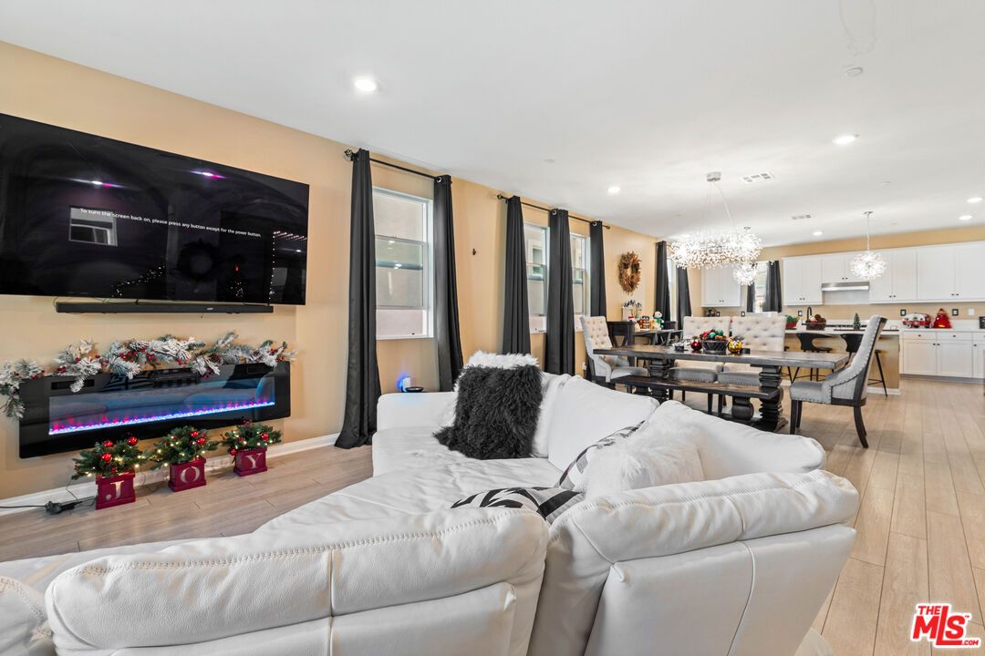 Chandelier, Dining room, Interior, Kitchen, Living room, Pendant Lights, Recessed Lighting, Wood Texture Flooring