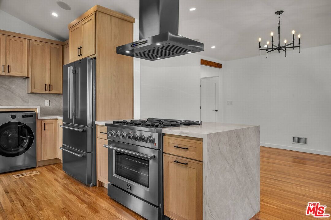 Interior, Kitchen, Recessed Lighting, Washer, Wood Texture Flooring