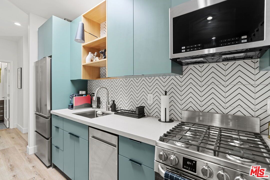 Interior, Kitchen, Recessed Lighting, Stainless Steel Appliances, Wood Texture Flooring