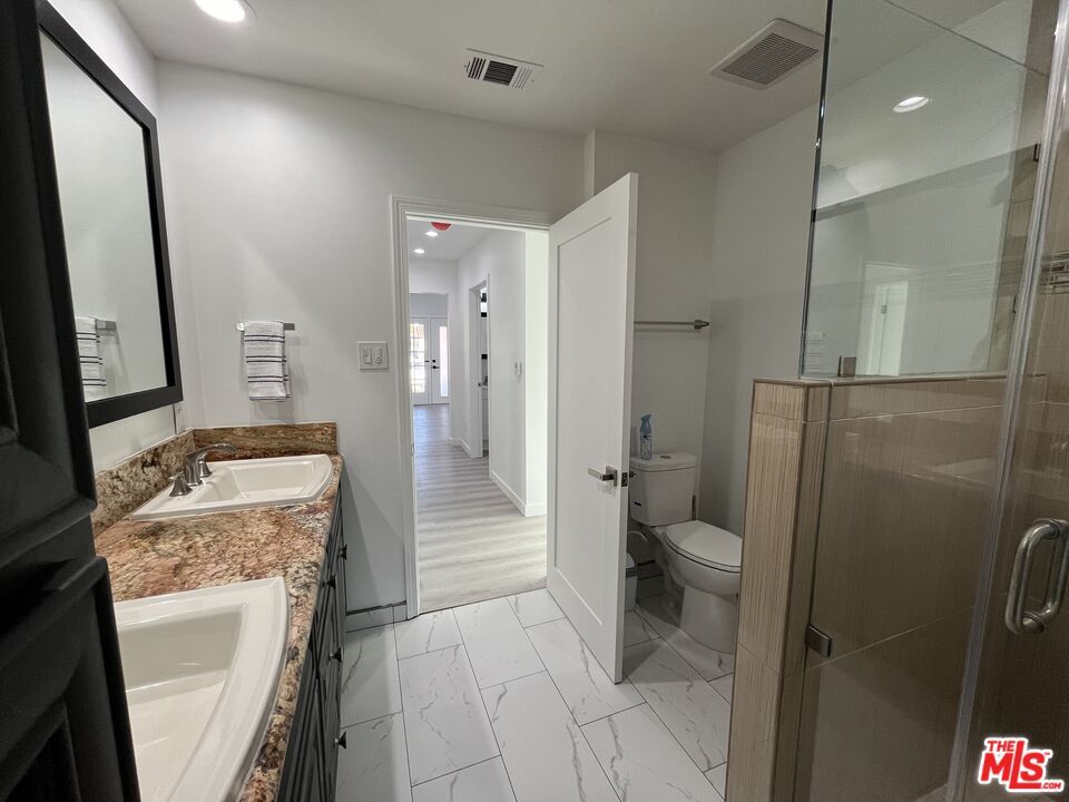 Bathroom, Dual Sink Vanities, Glass Shower, Interior, Marble, Recessed Lighting