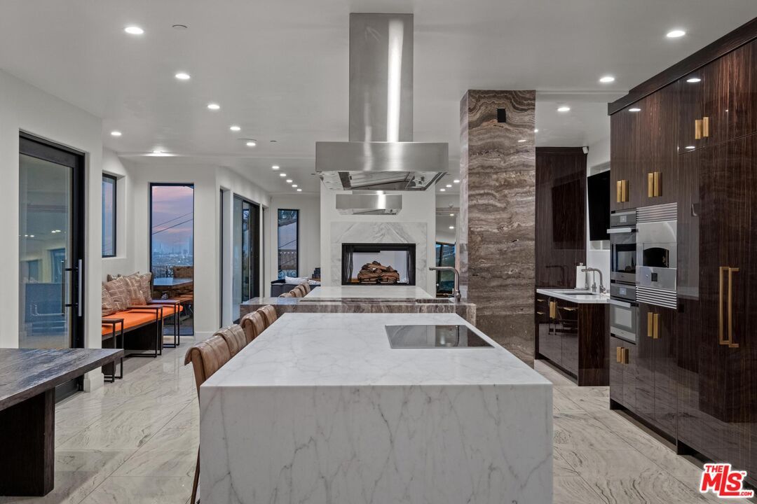 Fireplace, Interior, Kitchen, Living room, Marble, Recessed Lighting, Stainless Steel Appliances