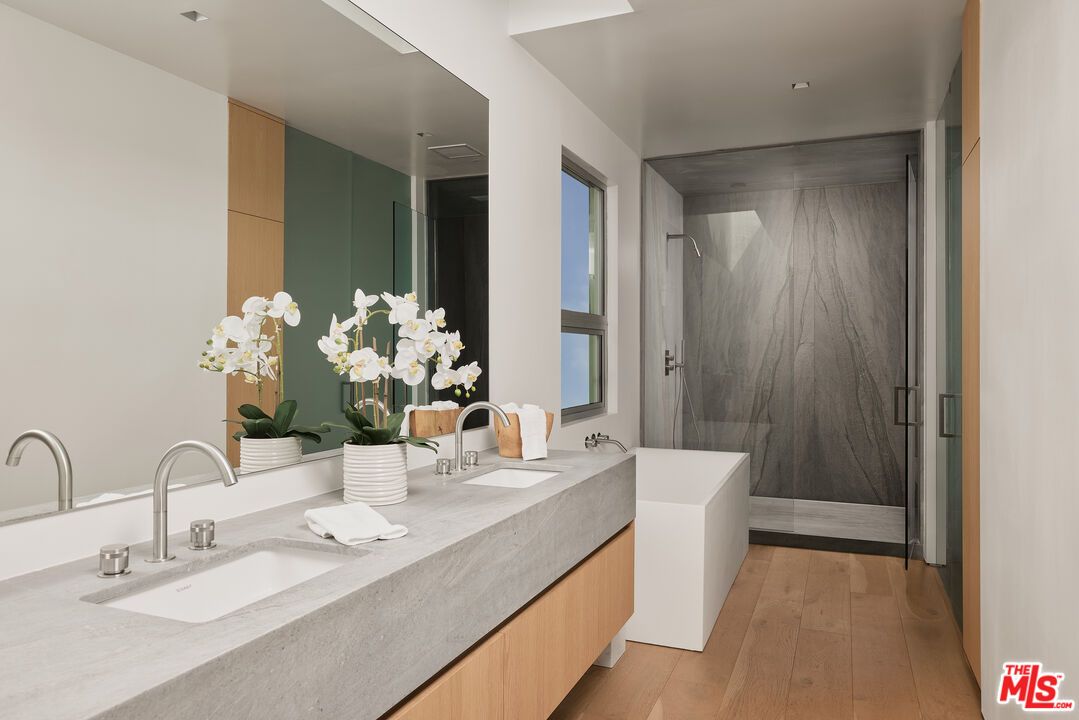 Bathroom, Dual Sink Vanities, Glass Shower, Interior, Recessed Lighting, Wood Texture Flooring