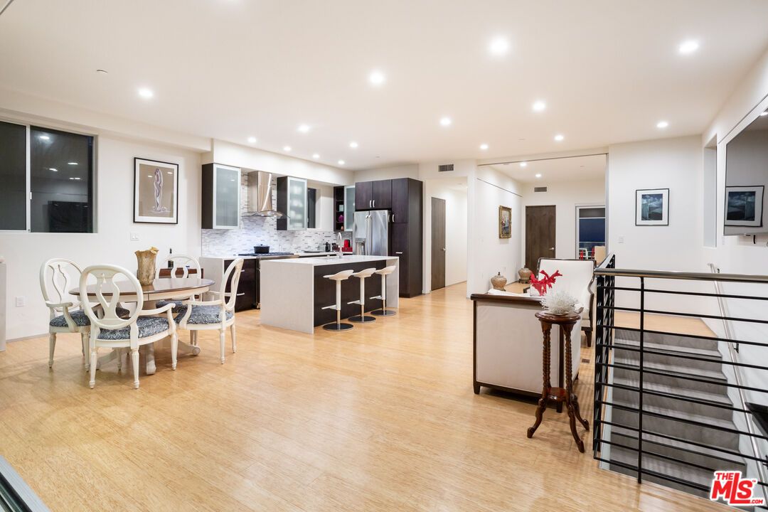 Dining room, Interior, Kitchen, Recessed Lighting, Stainless Steel Appliances, Wood Texture Flooring