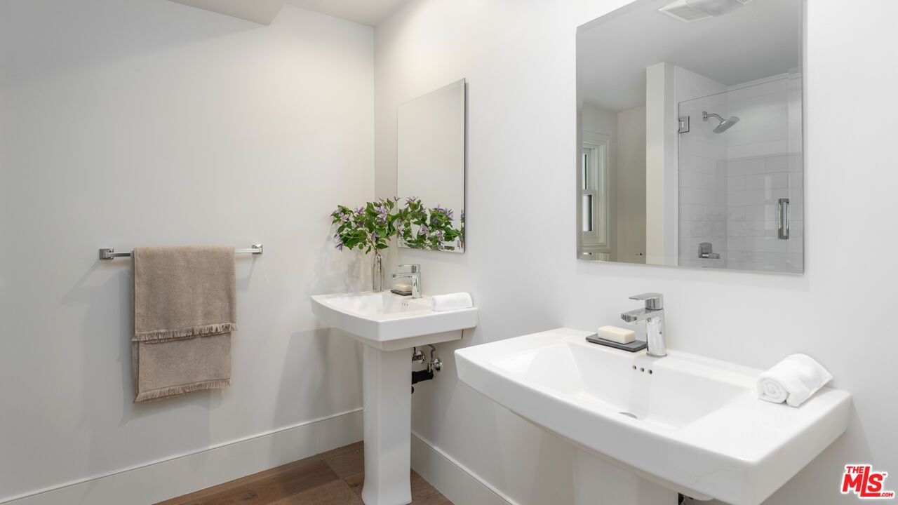 Bathroom, Dual Sink Vanities, Glass Shower, Interior, Wood Texture Flooring