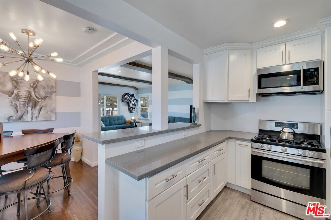 Interior, Kitchen, Pendant Lights, Recessed Lighting, Stainless Steel Appliances, Water, Wood Texture Flooring