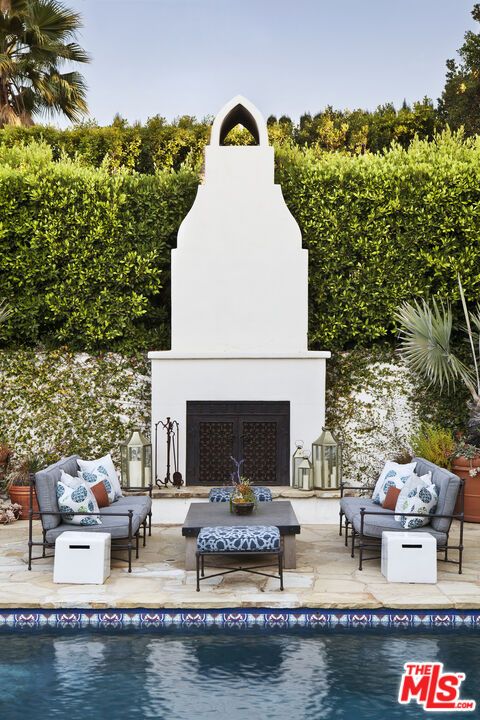 Exterior, Fireplace, Pool