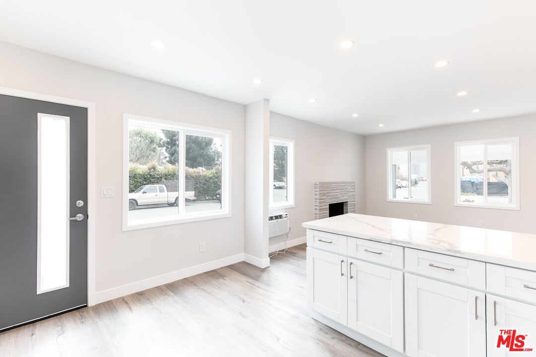 Fireplace, Interior, Kitchen, Recessed Lighting, Wood Texture Flooring