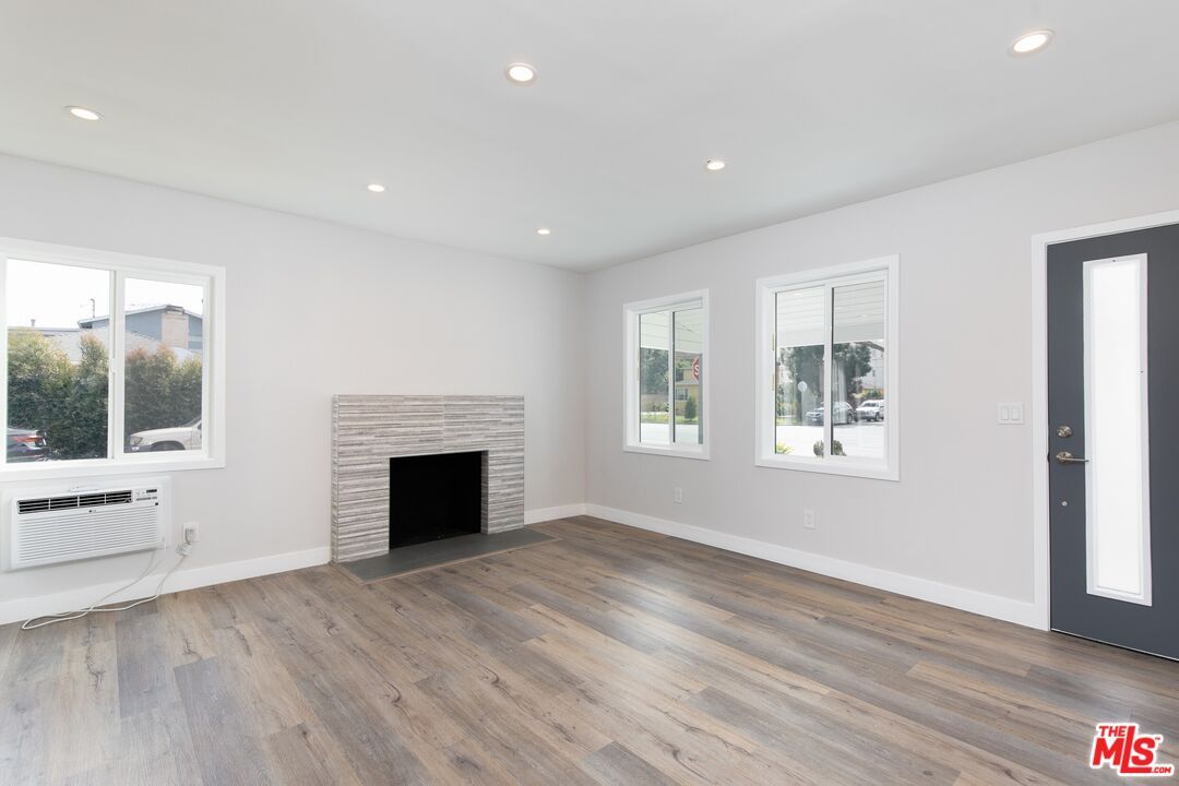 Empty room, Fireplace, Interior, Recessed Lighting, Wood Texture Flooring