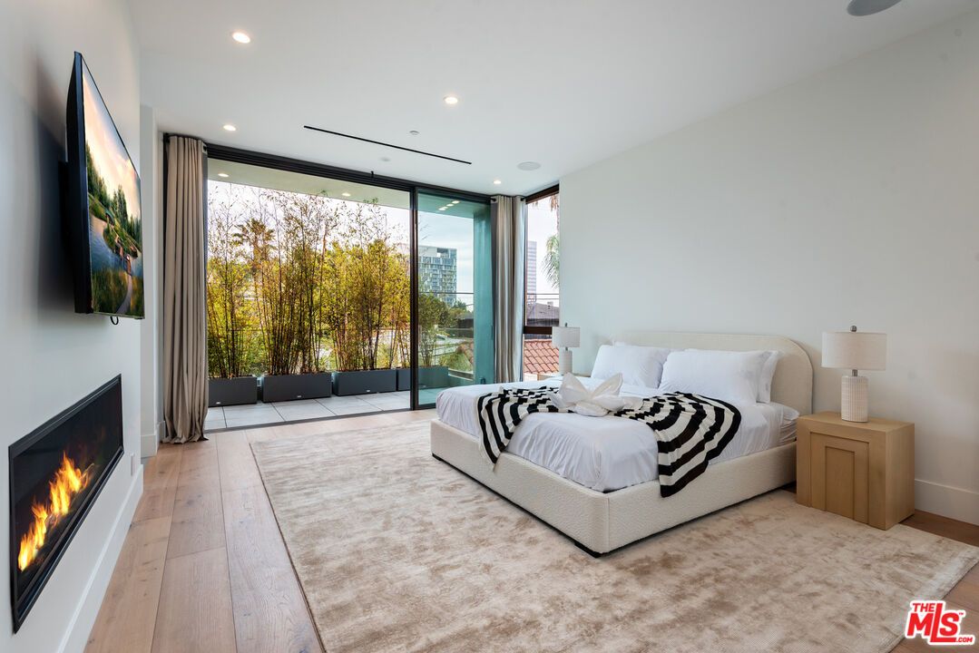 Bedroom, Fireplace, Interior, Recessed Lighting, Wood Texture Flooring