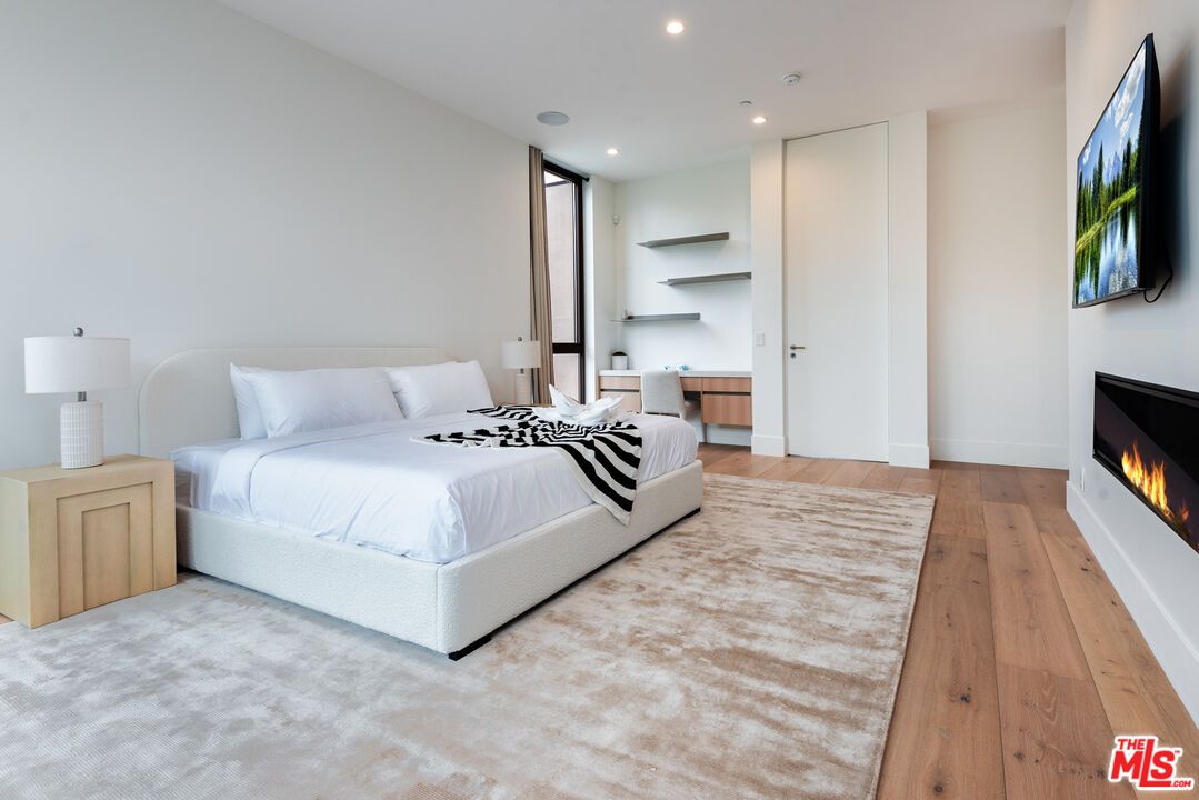 Bedroom, Fireplace, Interior, Recessed Lighting, Wood Texture Flooring