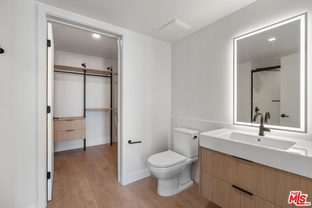 Bathroom, Glass Shower, Interior, Recessed Lighting, Wood Texture Flooring