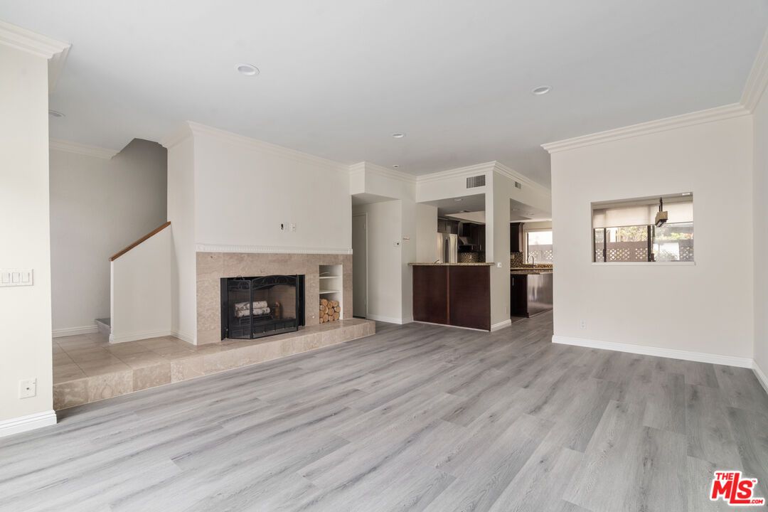 Empty room, Fireplace, Interior, Recessed Lighting, Wood Texture Flooring