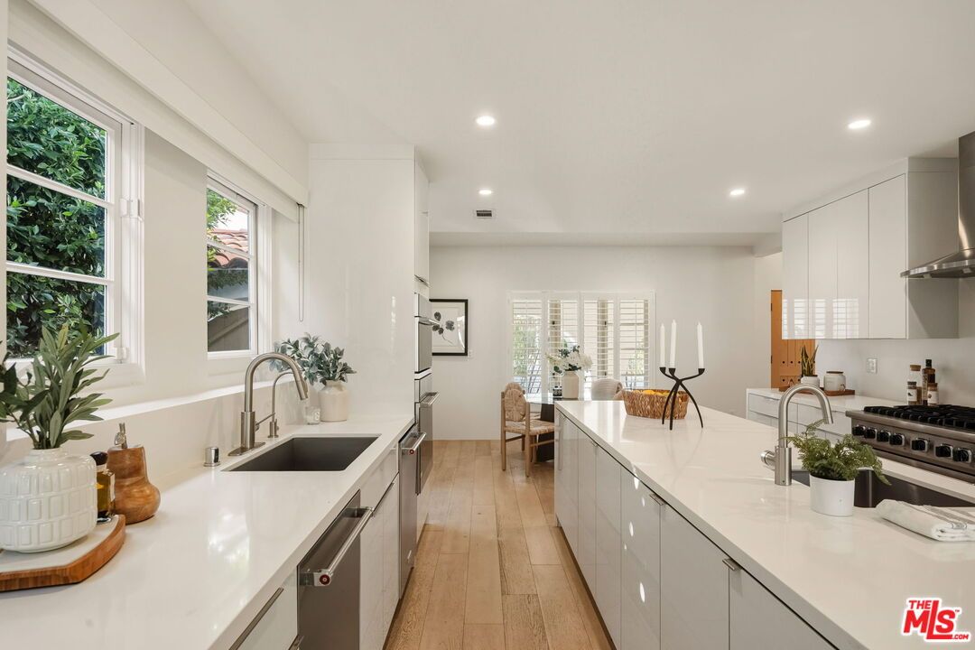 Dining room, Interior, Kitchen, Recessed Lighting, Stainless Steel Appliances, Wood Texture Flooring