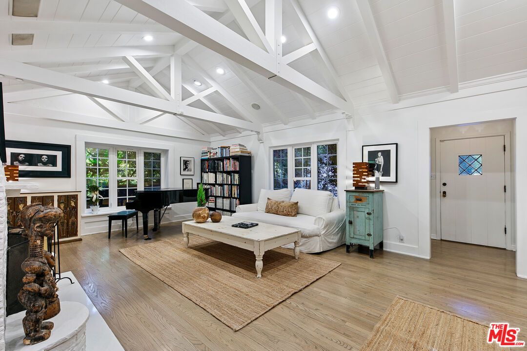 Fireplace, Interior, Living room, Piano, Recessed Lighting, Wood Texture Flooring