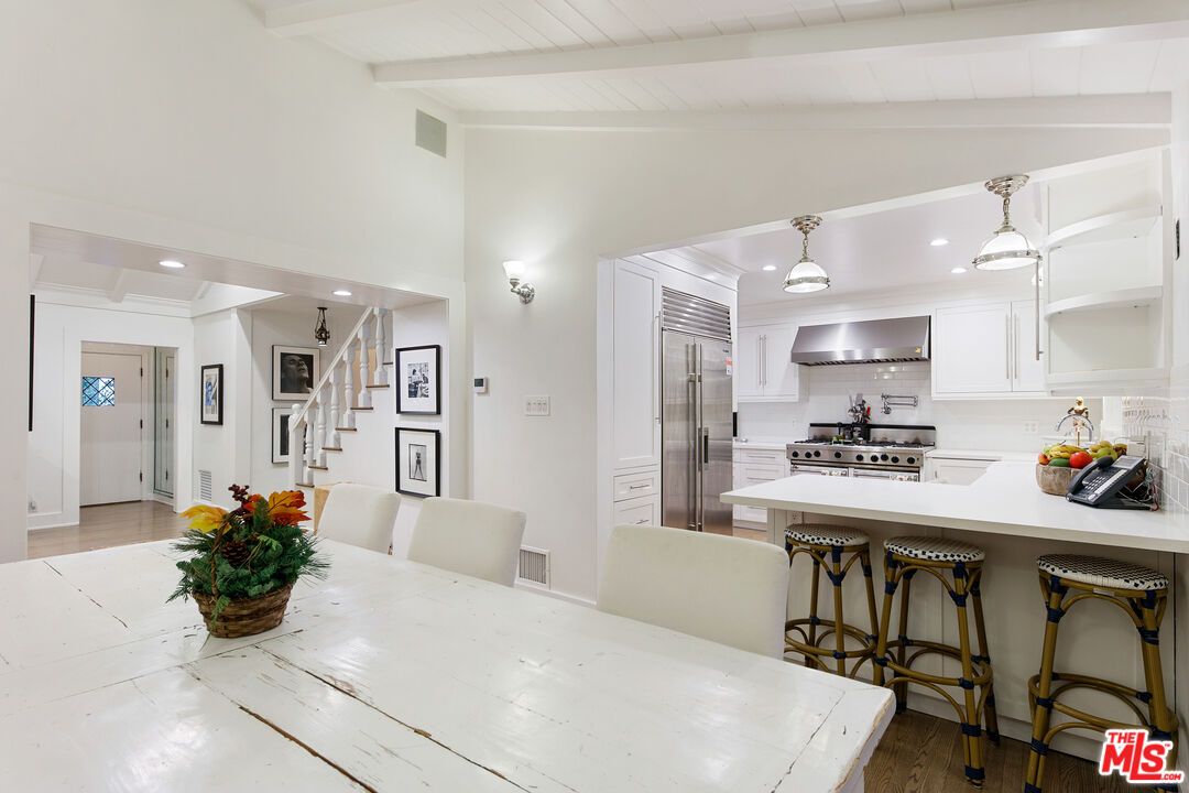 Dining room, Interior, Kitchen, Pendant Lights, Recessed Lighting, Stainless Steel Appliances, Wood Texture Flooring