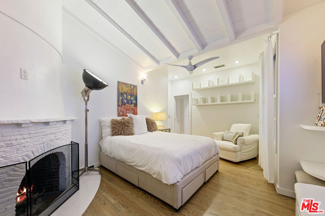 Bedroom, Fireplace, Interior, Recessed Lighting, Wood Texture Flooring