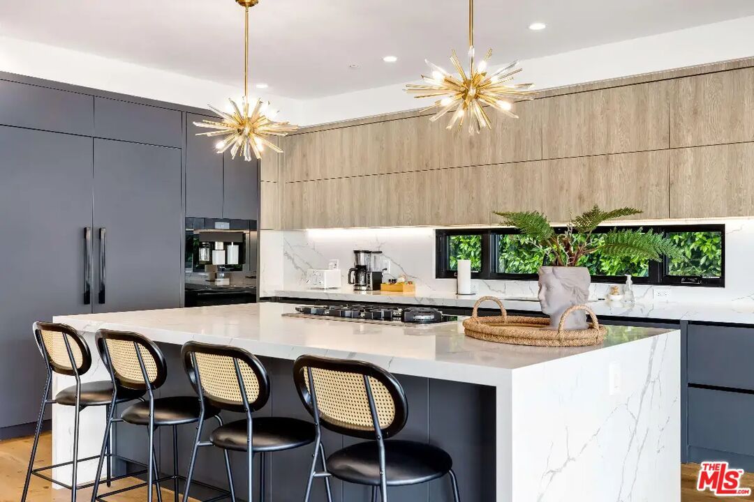 Interior, Kitchen, Marble Walls, Pendant Lights, Recessed Lighting, Stainless Steel Appliances