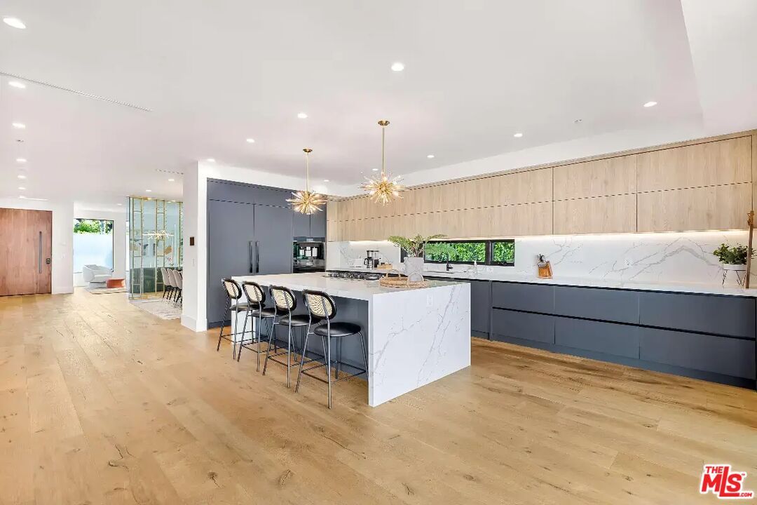 Interior, Kitchen, Marble Walls, Pendant Lights, Recessed Lighting, Wood Texture Flooring