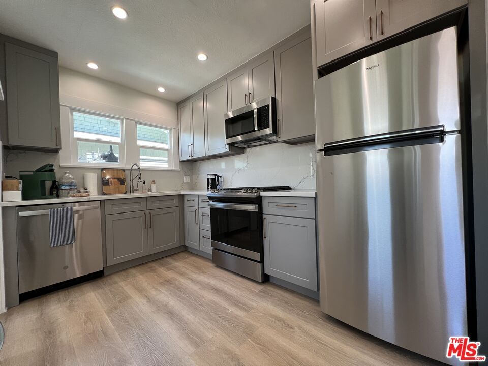 Interior, Kitchen, Recessed Lighting, Stainless Steel Appliances, Wood Texture Flooring