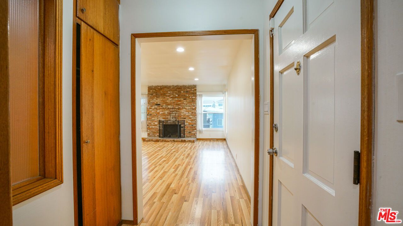 Fireplace, Interior, Recessed Lighting, Stone Walls, Wood Texture Flooring