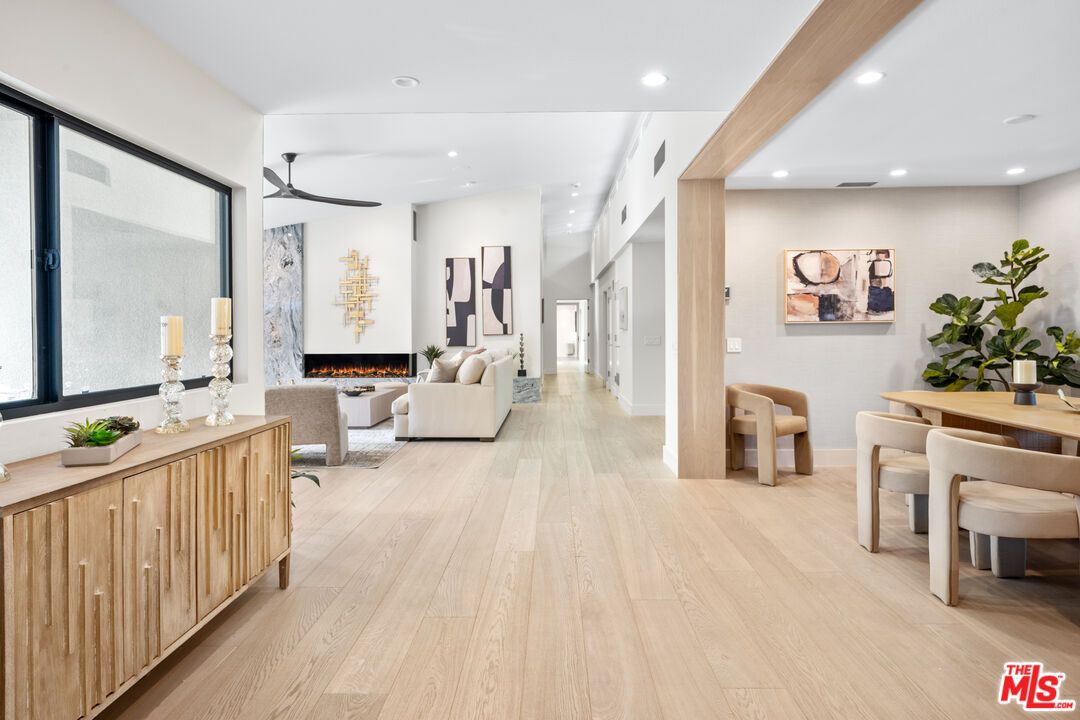 Dining room, Fireplace, Interior, Living room, Recessed Lighting, Wooden Beams, Wood Texture Flooring