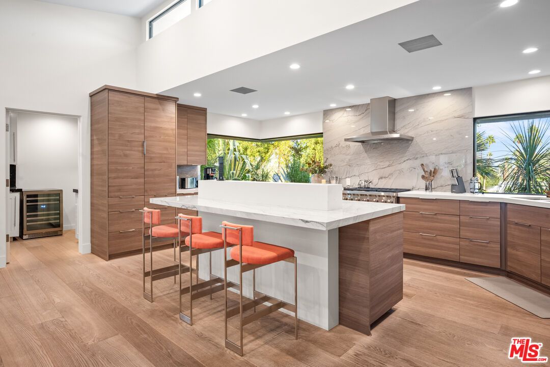 Interior, Kitchen, Marble Walls, Recessed Lighting, Stainless Steel Appliances, Wood Texture Flooring