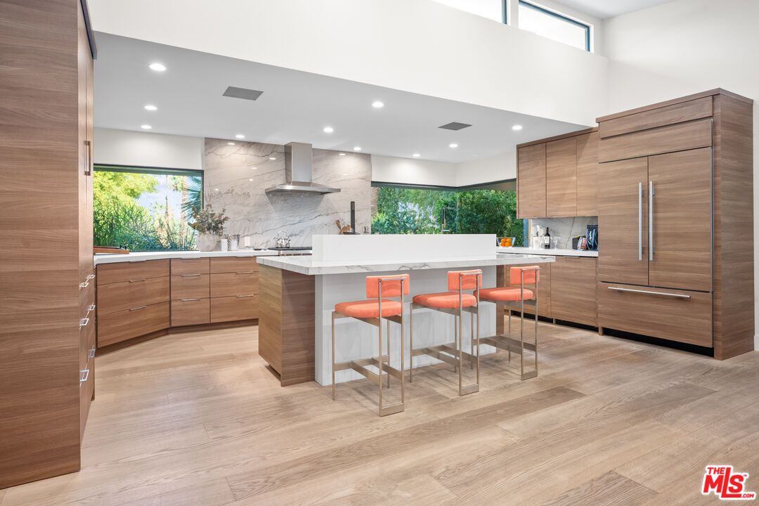 Interior, Kitchen, Marble Walls, Recessed Lighting, Stainless Steel Appliances, Wood Texture Flooring