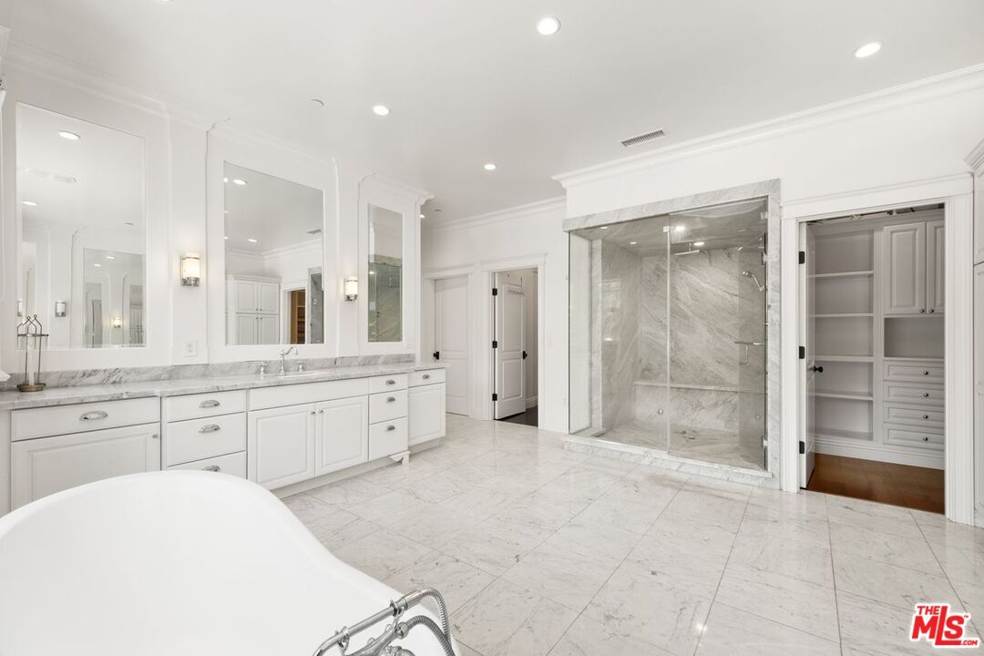 Bathroom, Dual Sink Vanities, Free Standing Baths, Glass Shower, Interior, Marble, Marble Walls, Recessed Lighting