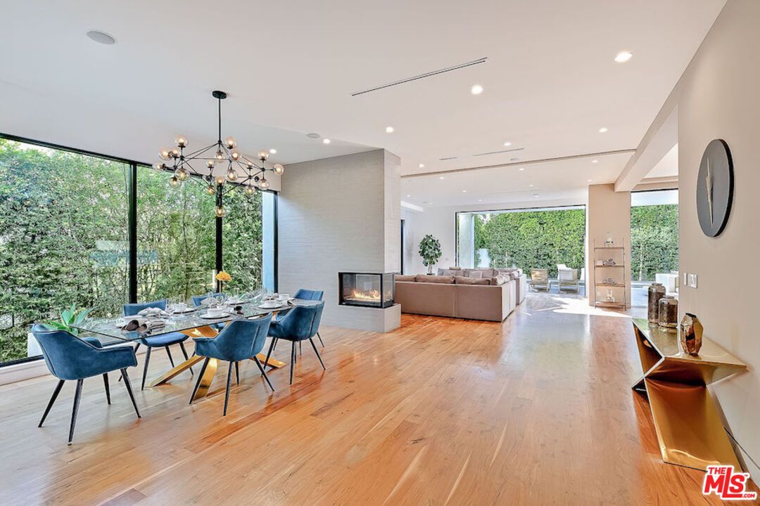 Dining room, Fireplace, Interior, Living room, Pendant Lights, Recessed Lighting, Wood Texture Flooring