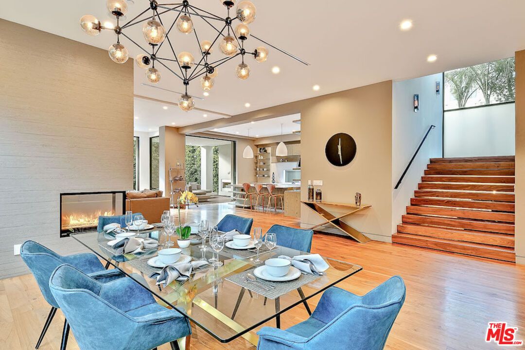 Dining room, Fireplace, Interior, Living room, Pendant Lights, Recessed Lighting, Wood Texture Flooring