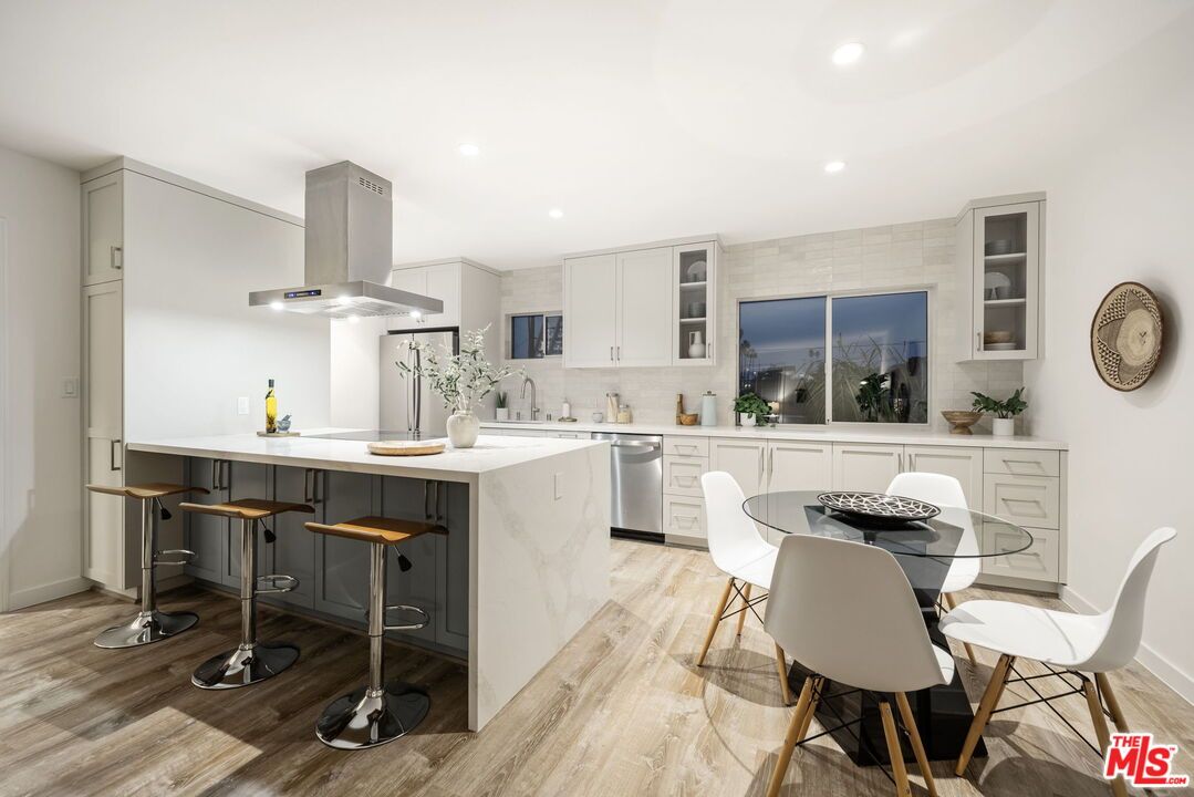 Dining room, Interior, Kitchen, Recessed Lighting, Stainless Steel Appliances, Wood Texture Flooring