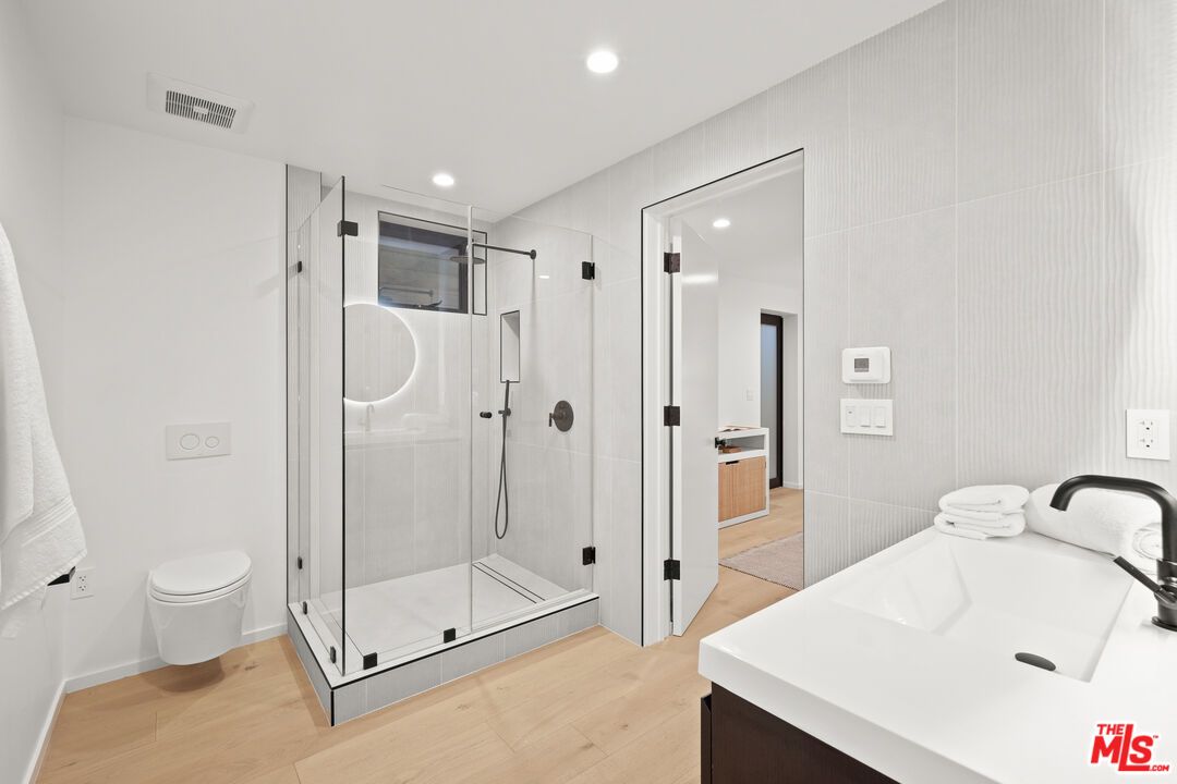 Bathroom, Glass Shower, Interior, Recessed Lighting, Wood Texture Flooring