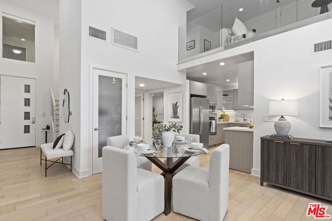 Dining room, Interior, Kitchen, Recessed Lighting, Stainless Steel Appliances, Wood Texture Flooring