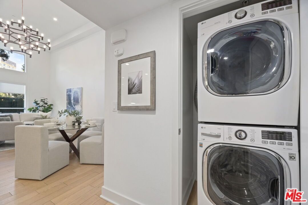 Dining room, Interior, Pendant Lights, Recessed Lighting, Utility Closets, Washer, Wood Texture Flooring