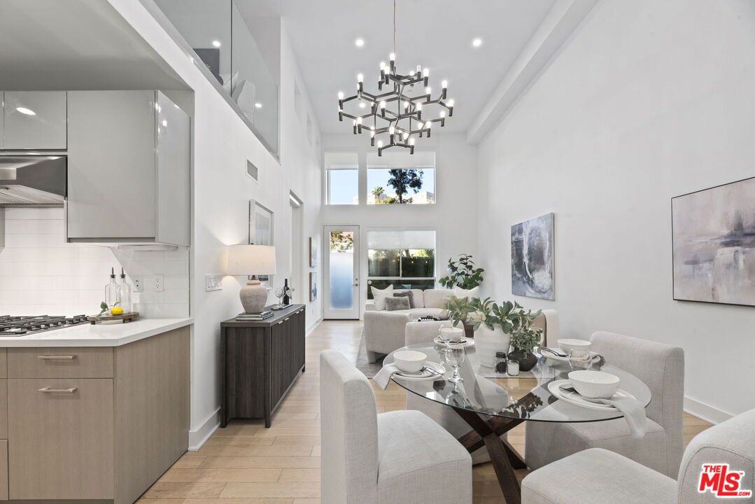 Dining room, Interior, Kitchen, Living room, Pendant Lights, Recessed Lighting, Stainless Steel Appliances, Wood Texture Flooring