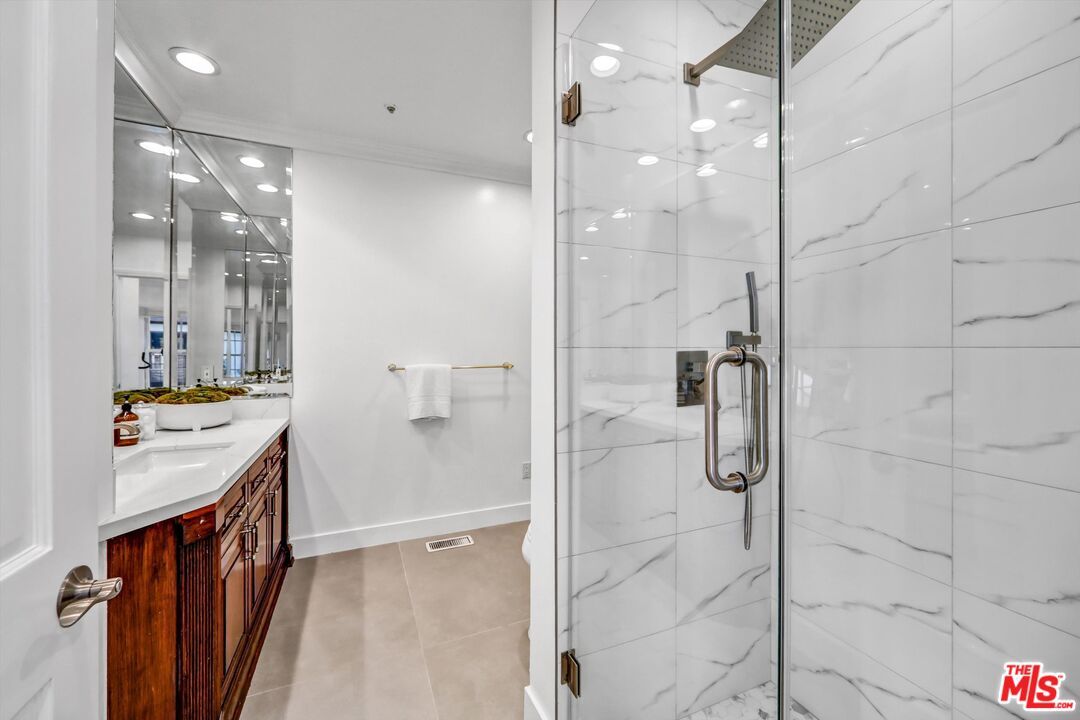 Bathroom, Dual Sink Vanities, Glass Shower, Interior, Marble Walls, Recessed Lighting