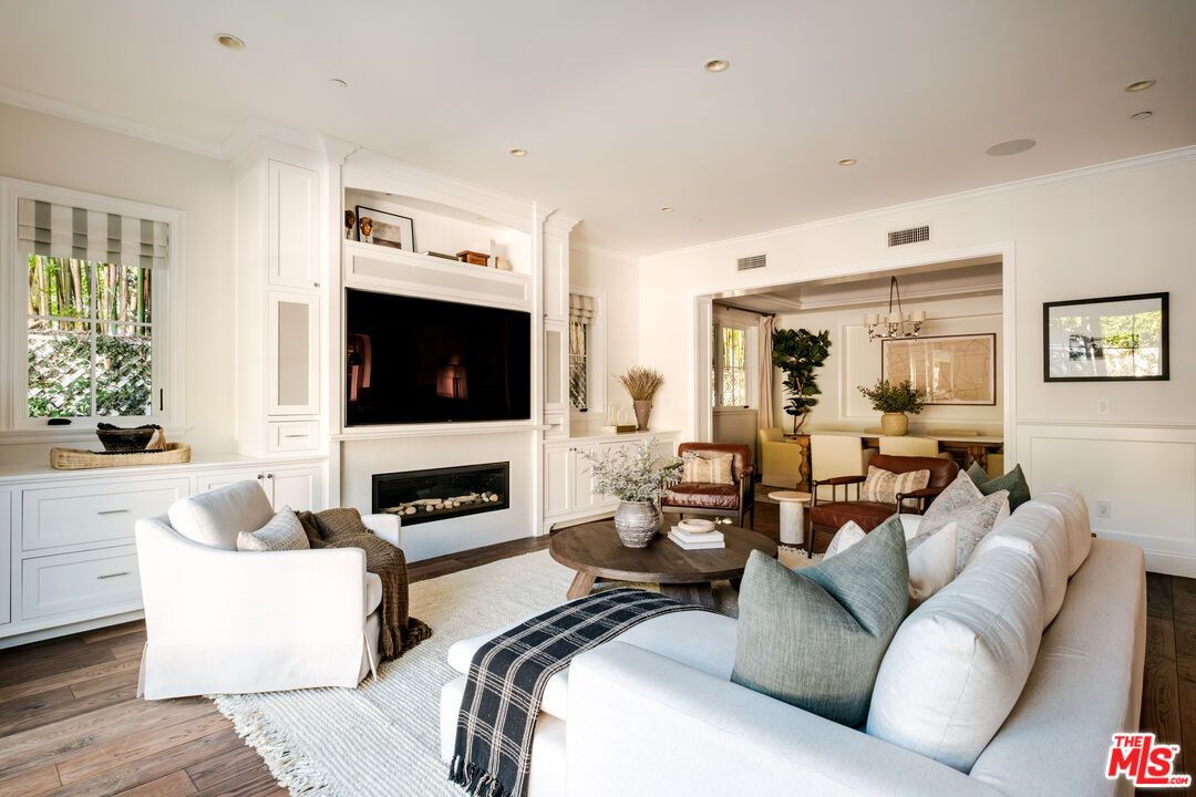 Chandelier, Dining room, Fireplace, Interior, Living room, Recessed Lighting, Wood Texture Flooring