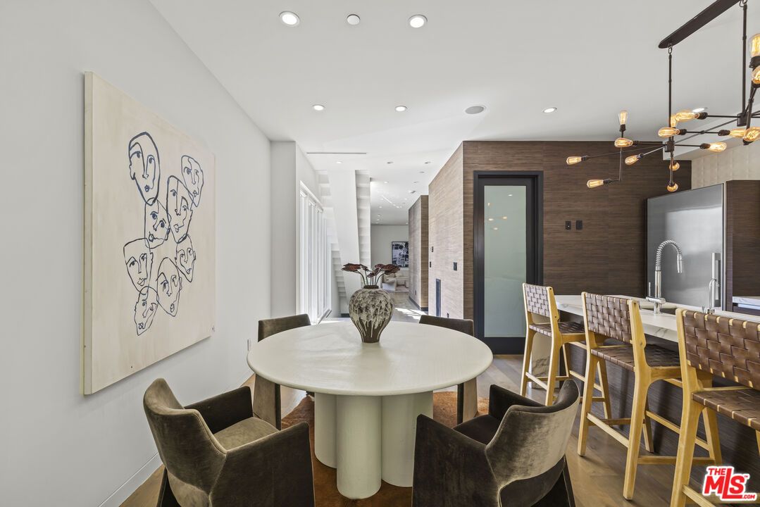 Dining room, Interior, Kitchen, Pendant Lights, Recessed Lighting, Stainless Steel Appliances, Wood Texture Flooring